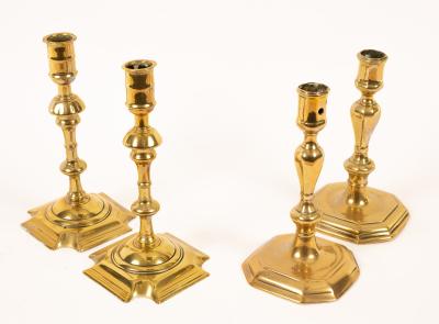 Appraisal: A pair of th Century brass candlesticks with baluster stems