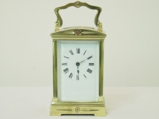 Appraisal: French carriage clock time only shaped handle and domed top