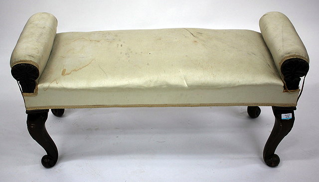 Appraisal: A TH CENTURY MAHOGANY WINDOW SEAT with cream overstuffed upholstered