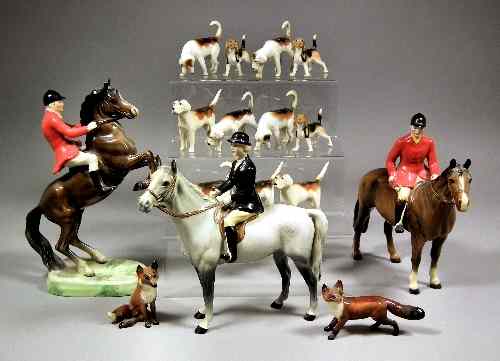 Appraisal: A group of Beswick pottery figures of huntsmen foxhounds and