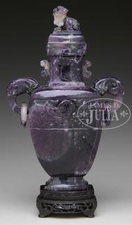 Appraisal: CARVED AMETHYST COVERED VASE th century China The vase carved