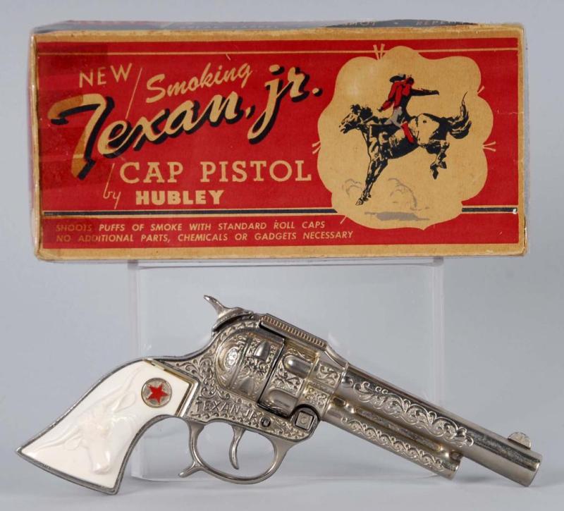 Appraisal: Hubley Texan Jr Cap Gun Description Die-cast Includes box Tape