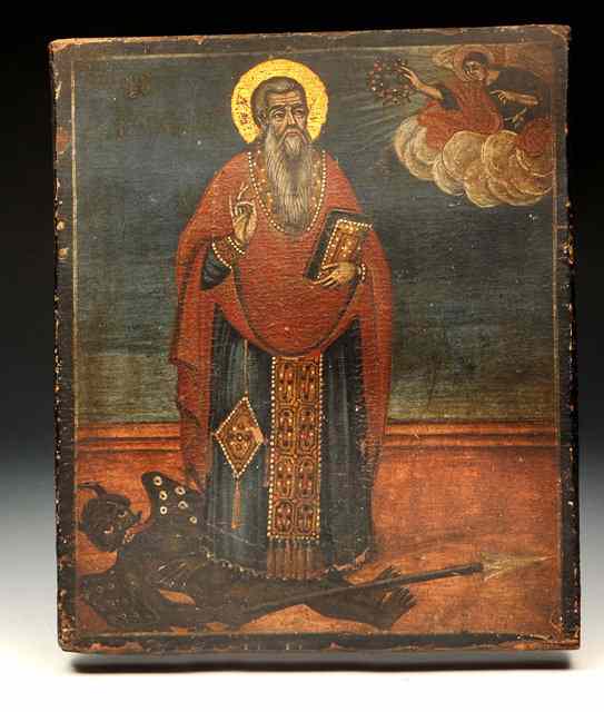 Appraisal: A TH CENTURY ICON ON WOOD depicting a Saint standing