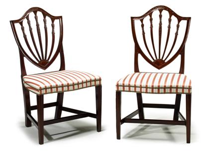 Appraisal: Pair of Federal carved and inlaid shield-back mahogany side chairspossibly