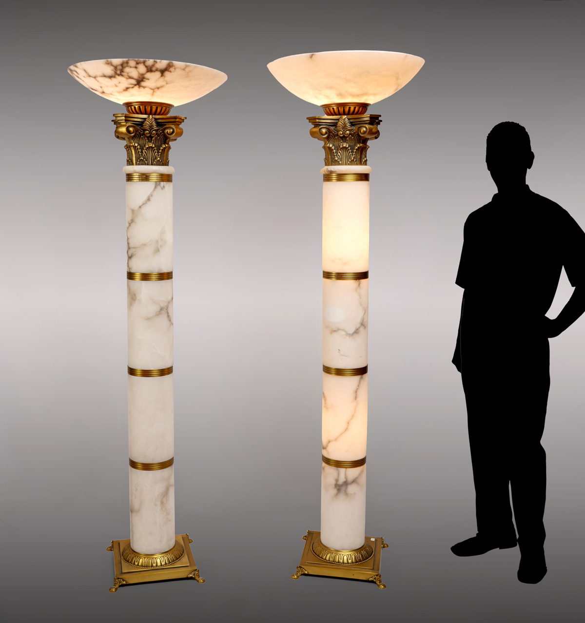 Appraisal: PAIR OF ALABASTER COLUMN FORM FLOOR LAMPS Pair of segmented