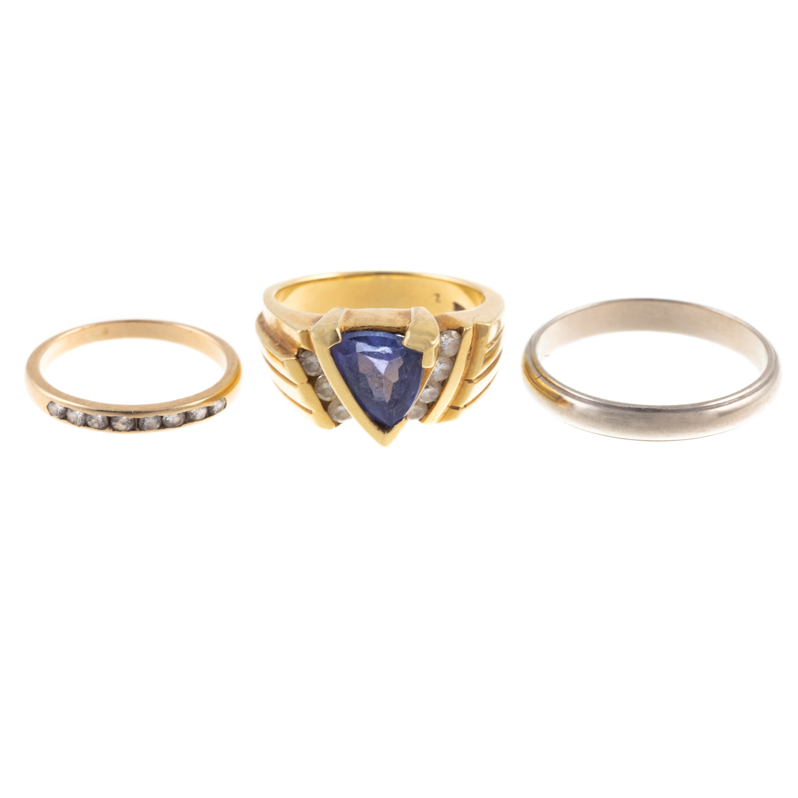 Appraisal: AN K TANZANITE RING TWO GOLD BANDS K yellow gold