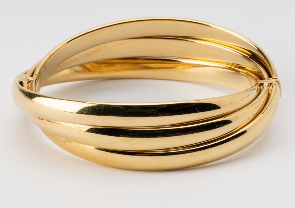 Appraisal: KARAT YELLOW GOLD TWIST BANGLE BRACELETapproximately inches inner circumference grams