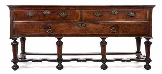 Appraisal: An English Burlwood Sideboard having a rectangular top over two