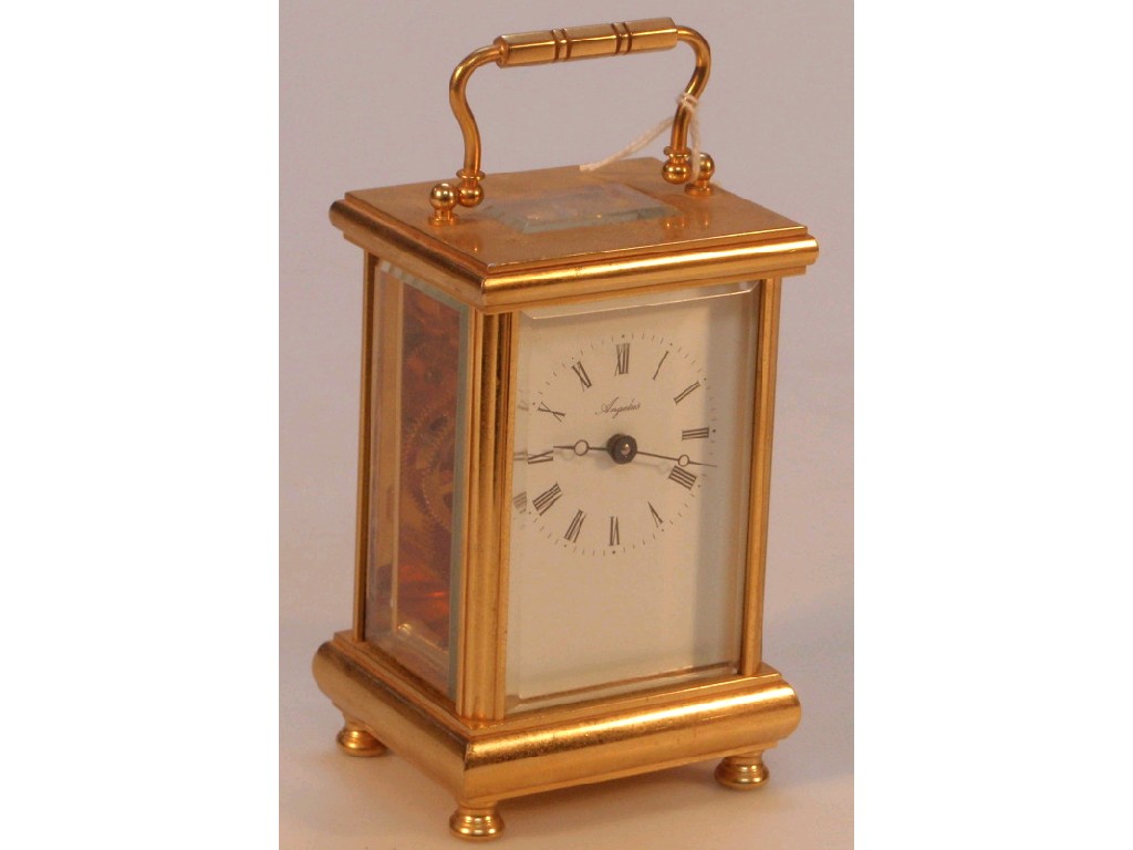 Appraisal: A modern gilt brass carriage timepiece by Angelus cm excluding