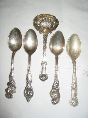 Appraisal: AN AMERICAN SIFTER SPOON in Fiddle and Shell type pattern