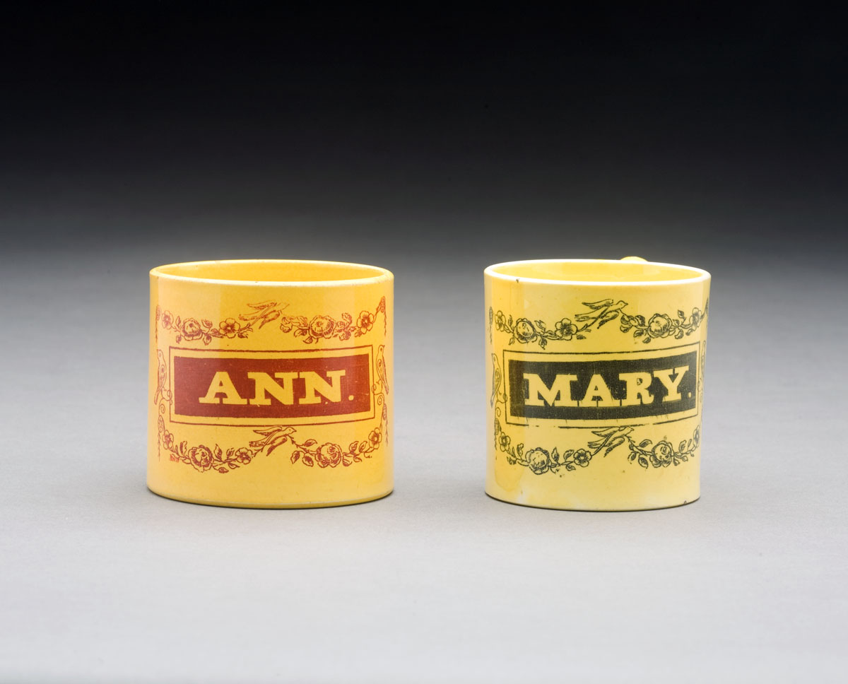 Appraisal: TWO ENGLISH YELLOW-GLAZED TRANSFER-PRINTED CHILDREN'S MUGS CIRCA - The first