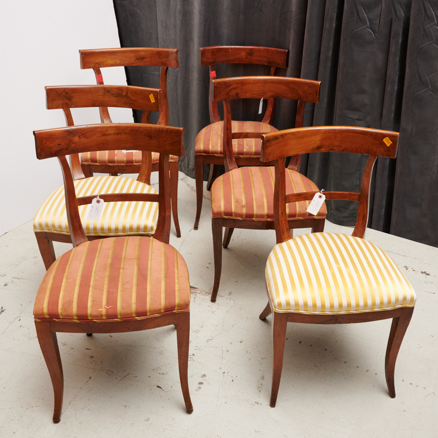 Appraisal: CONTINENTAL NEOCLASSICAL STYLE DINING CHAIRS th c incl with cranberry