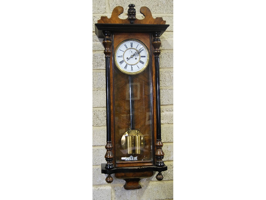 Appraisal: A th century Vienna wall clock with cylindrical weights in