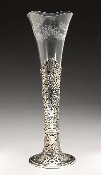 Appraisal: A German standard silver reticulated vase frame with engraved glass