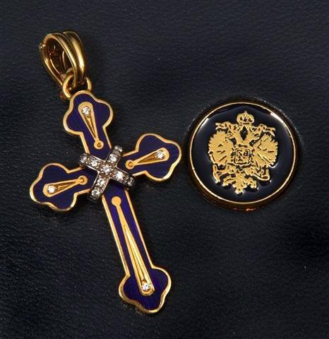 Appraisal: A CONTEMPORARY GOLD ENAMEL AND DIAMOND CROSS PENDANT signed Faberg