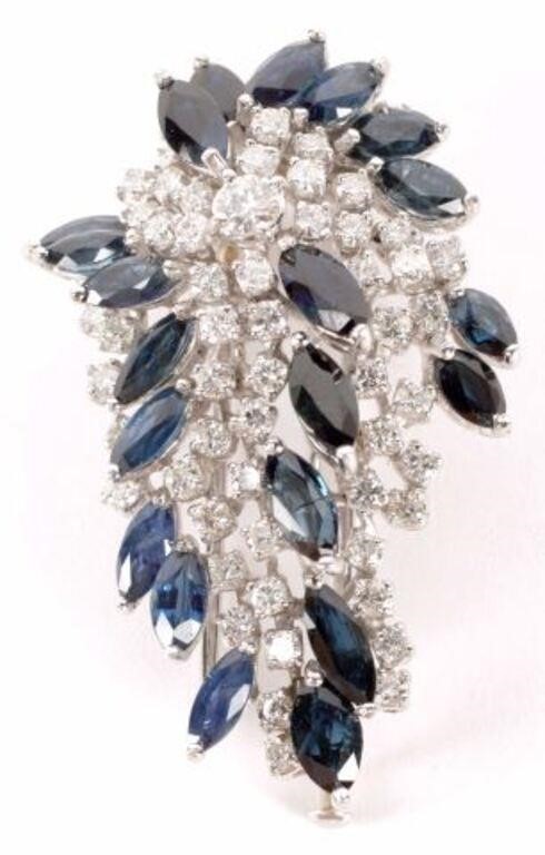 Appraisal: Estate kt white gold fur clip twenty-one marquise blue sapphires