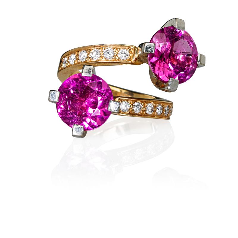 Appraisal: RUBELLITE AND DIAMOND K GOLD BYPASS RING Two RBC rubellite