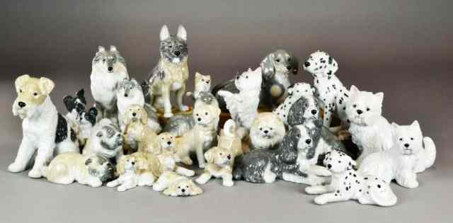 Appraisal: Porcelain Dogs FigurinesDepicting many different breeds with painted highlights Largest