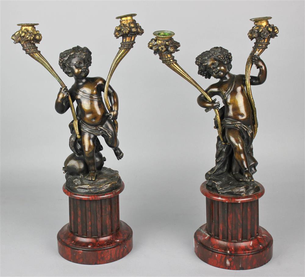 Appraisal: PAIR OF LOUIS XVI STYLE PATINATED METAL CANDELABRA each formed