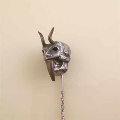 Appraisal: An unusual stick pin with a skull and hinged mask