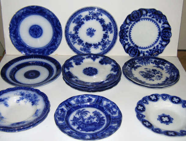 Appraisal: GROUP OF ENGLISH FLOW BLUE POTTERY Soup and dinner plates