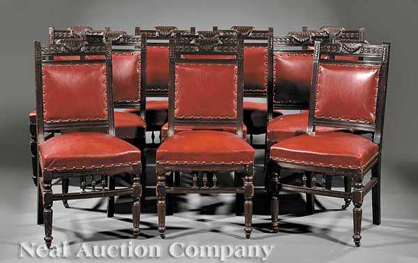 Appraisal: A Suite of Twelve Renaissance Revival Carved Walnut Dining Chairs