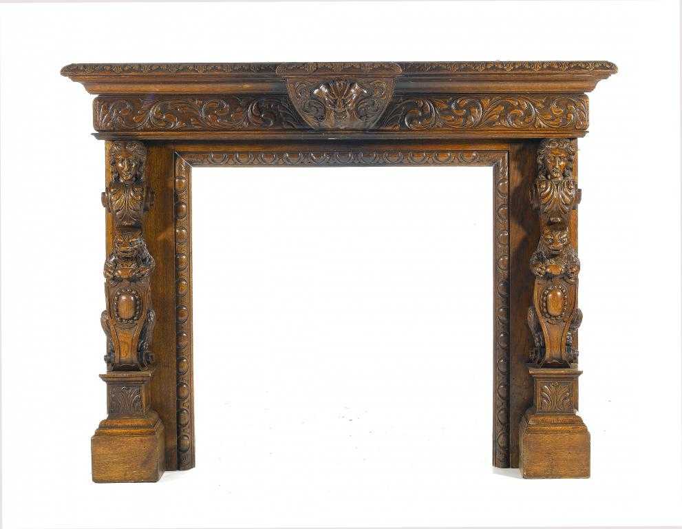 Appraisal: AN EDWARD VII CARVED OAK CHIMNEYPIECE the breakfront accanthus shelf