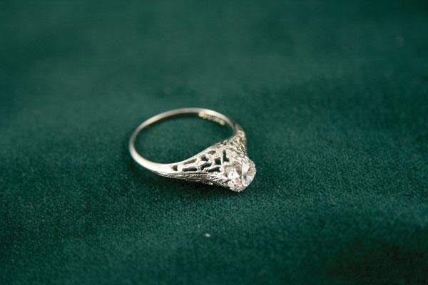 Appraisal: A single stone Diamond Ring brilliant-cut stone claw-set with pierced