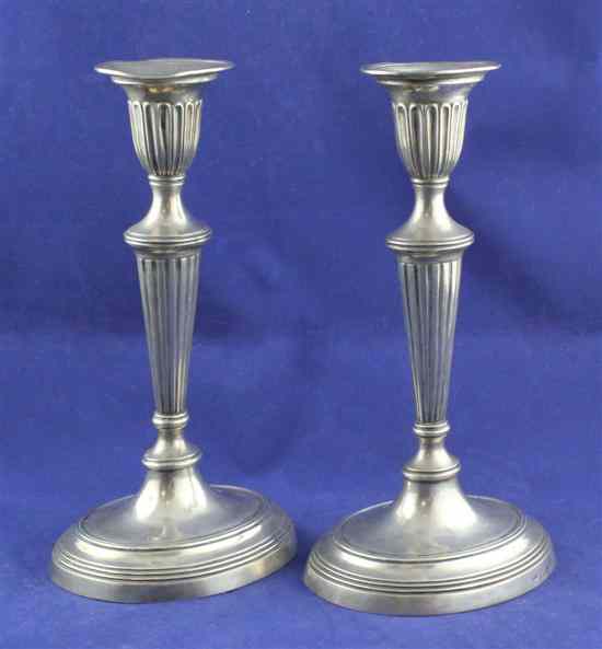 Appraisal: A pair of th century South American silver candlesticks with