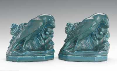 Appraisal: A Pair of Rookwood Rook Bookends Gray-blue vellum overglaze over