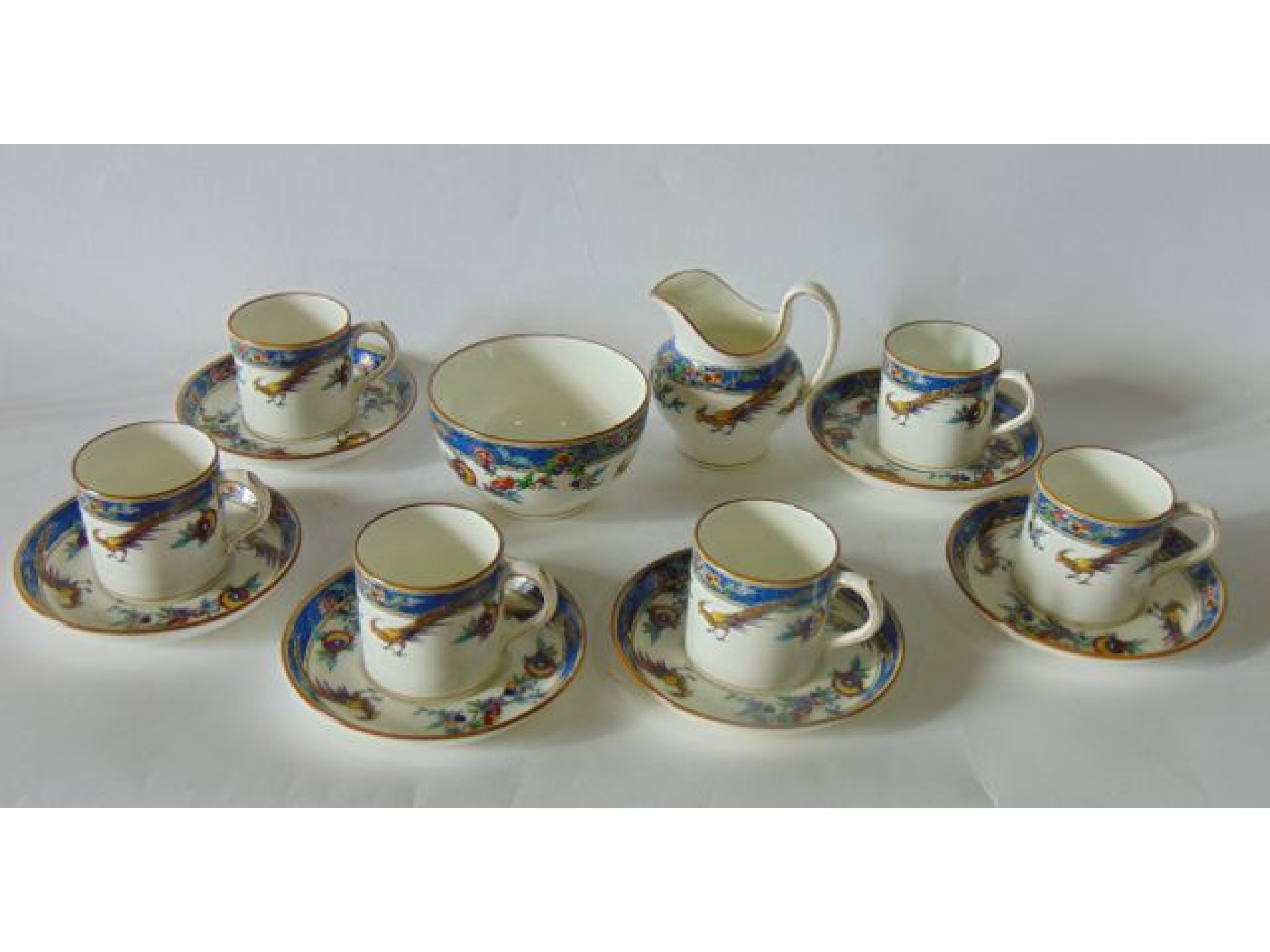 Appraisal: A collection of Minton coffee wares marked to base Sinclair