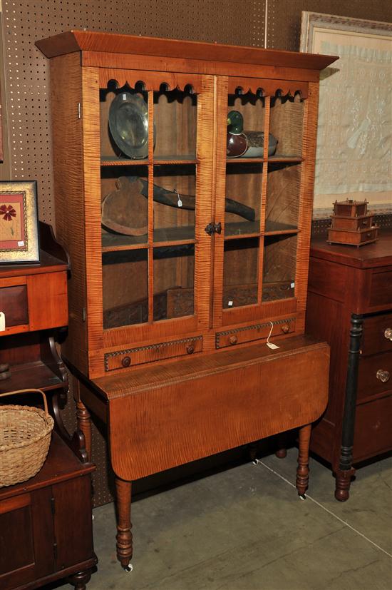 Appraisal: TWO PIECE COUNTRY SECRETARY BOOKCASE Curly maple with poplar secondary