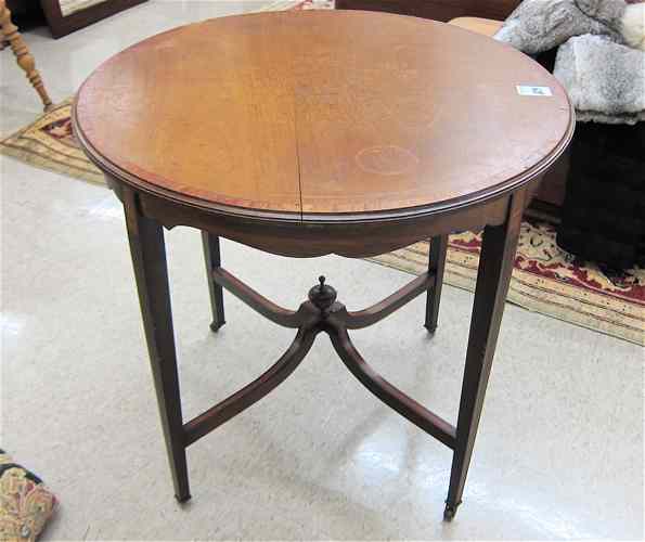 Appraisal: EDWARDIAN MAHOGANY LAMP TABLE English early th century having a