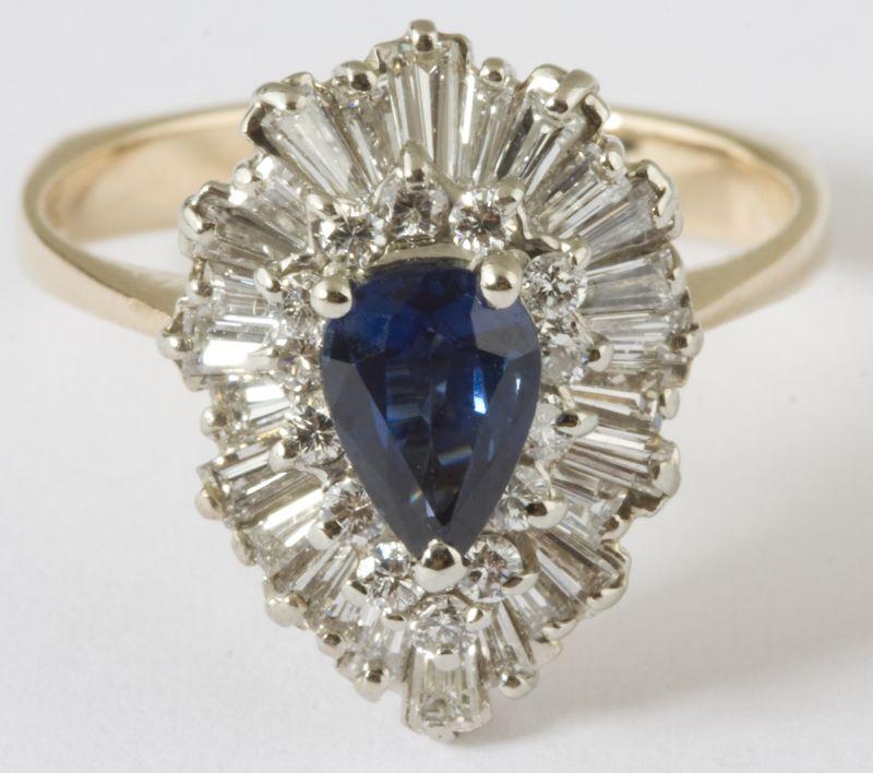 Appraisal: KT Platinum Diamond Sapphire Ballerina Ring containing one pear shaped