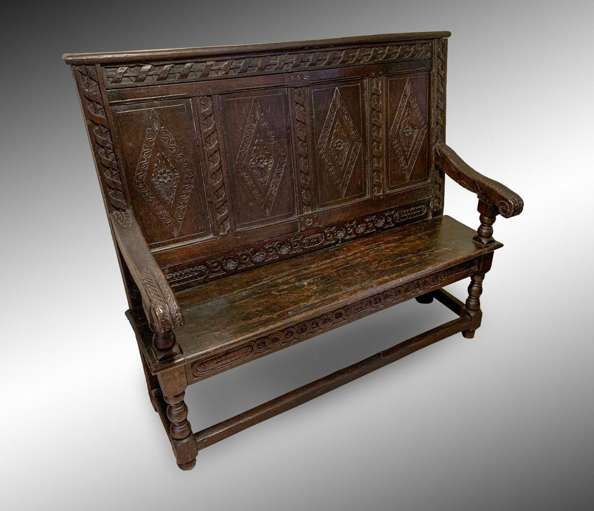 Appraisal: EARLY CARVED OAK BENCH Early carved Oak bench having panels