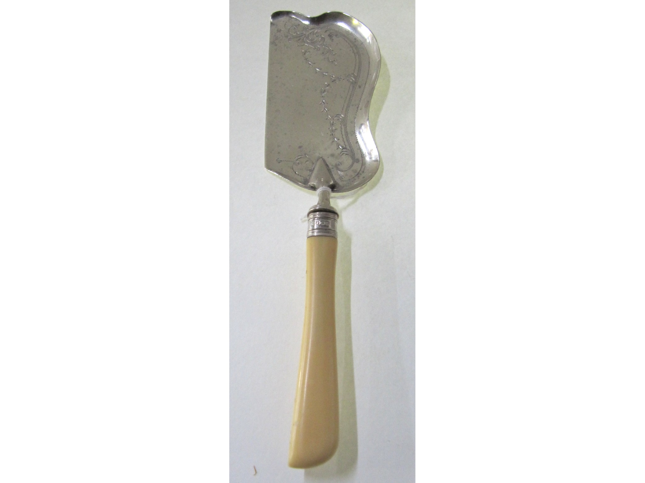 Appraisal: A silver and bone handled crumb scoop Sheffield