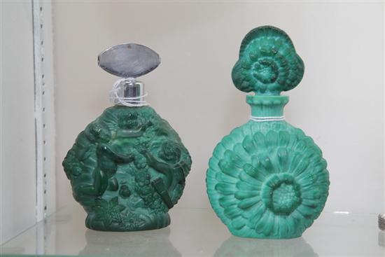 Appraisal: TWO CZECHOSLOVAKIAN MALACHITE GREEN GLASS PERFUME BOTTLES One relief decorated