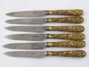 Appraisal: A set of six silver gilt handled knives by William