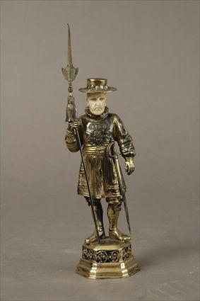 Appraisal: Gilt-Metal and Ivory Figure of a Beefeater in