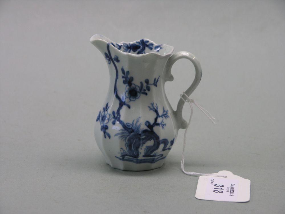 Appraisal: An th century English porcelain milk jug bulbous shape painted