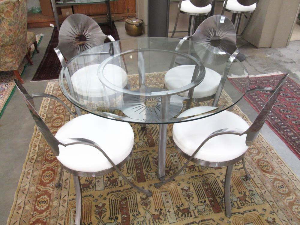 Appraisal: A CONTEMPORARY DINING TABLE AND CHAIR SET Johnston Casuals Furniture