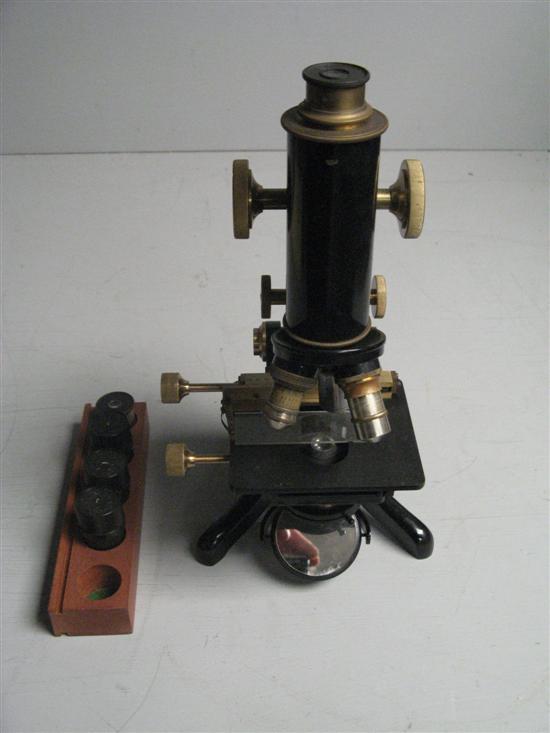 Appraisal: Early twentieth century brass and metal microscope by G Barker