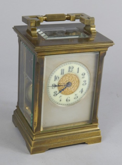 Appraisal: A late thC French brass carriage clock with loop handle