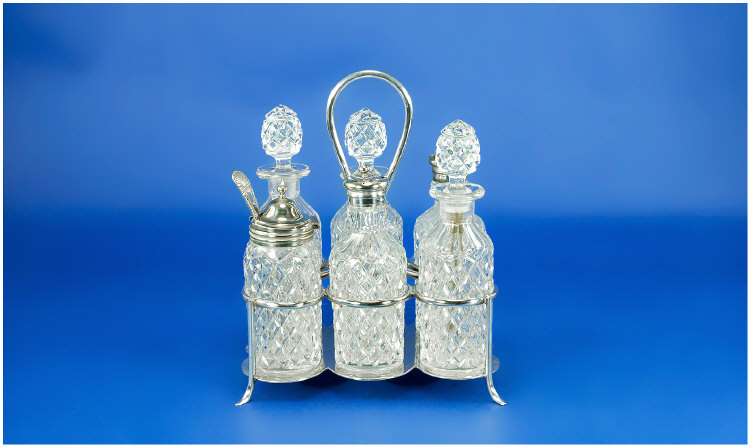 Appraisal: Silver Plated and Glass Cruet Set With stand inches tall