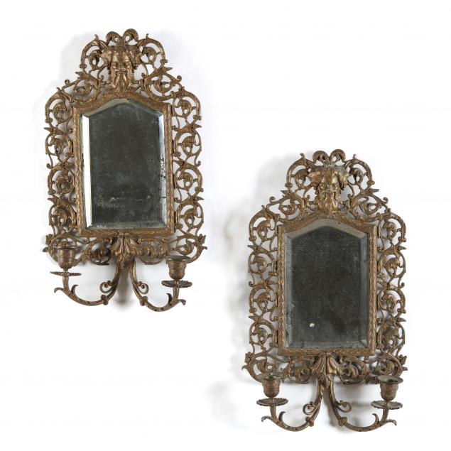 Appraisal: PAIR OF ANTIQUE CONTINENTAL FIGURAL ORMOLU MIRRORED SCONCES Late th