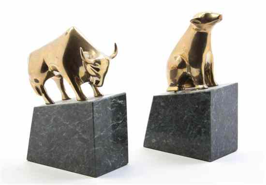 Appraisal: A Pair of Brass and Marble Bookends depicting a stylized