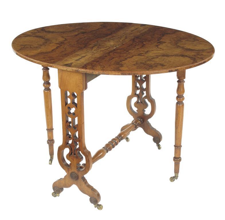 Appraisal: A Victorian walnut Sutherland table