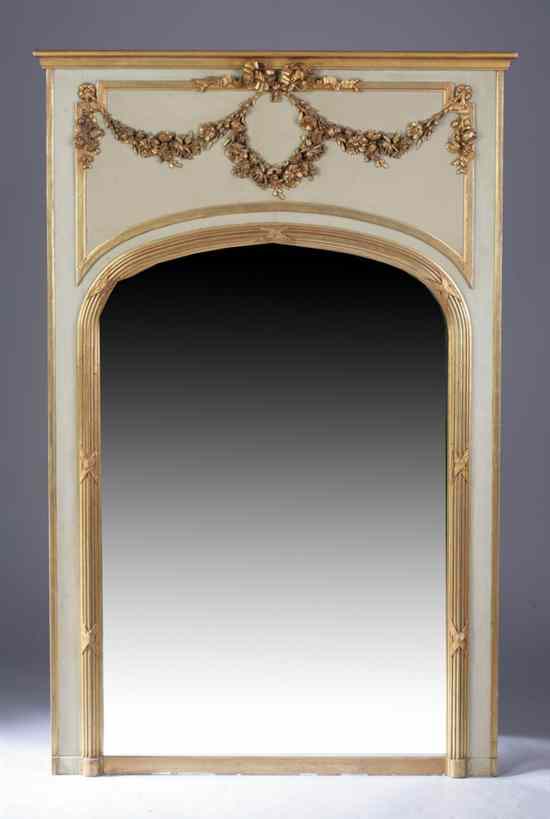 Appraisal: LOUIS XVI STYLE CREAM-PAINTED AND PARCEL-GILT OVERMANTEL MIRROR Projected crest