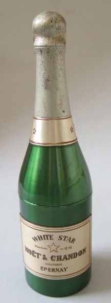 Appraisal: A cigarette dispenser formed as a MOET CHANDON bottle and