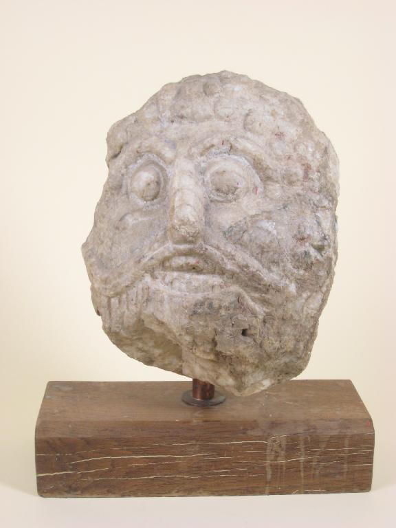 Appraisal: An ancient marble Carving of the head of a bearded